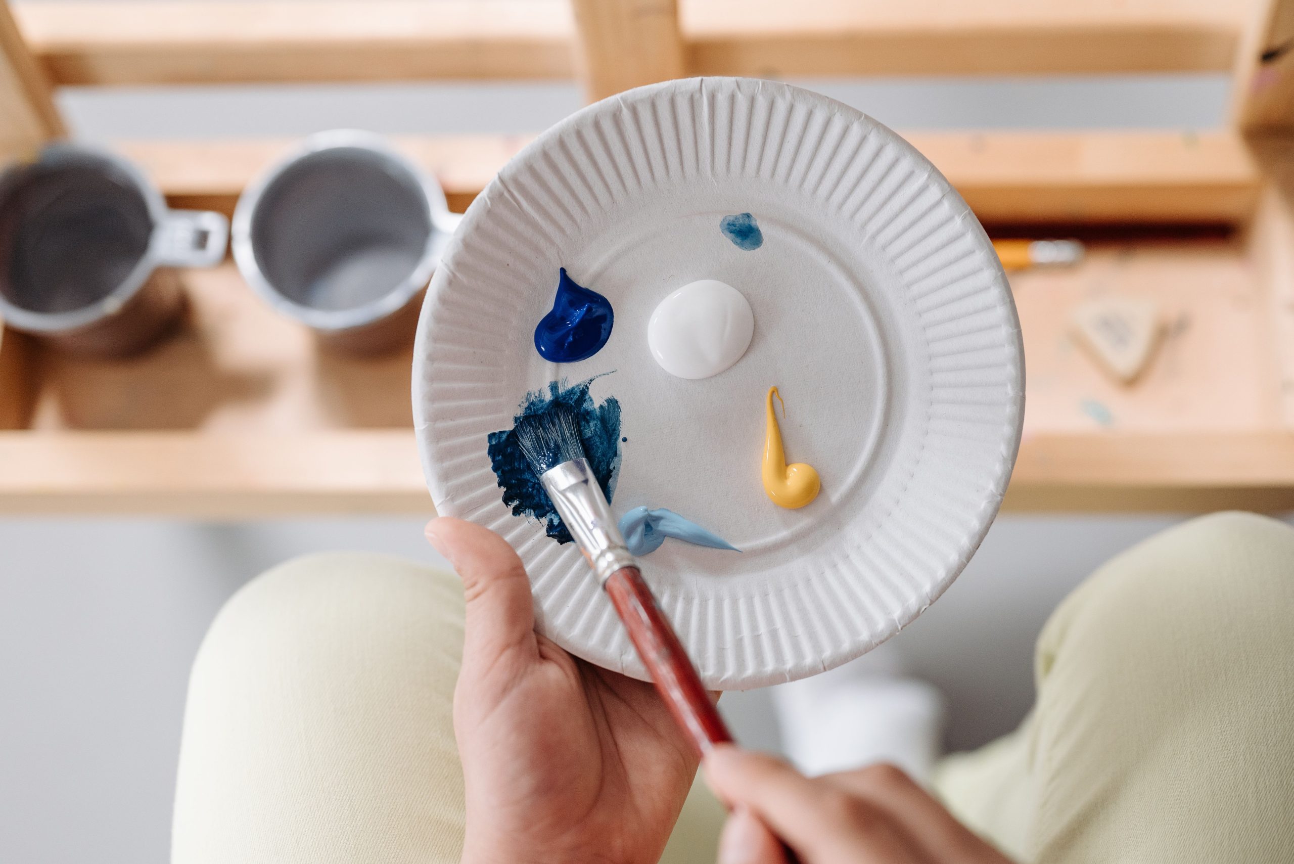 Acrylic paint on white plastic plates
